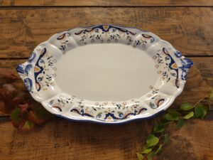 Plat de service ancien en faïence